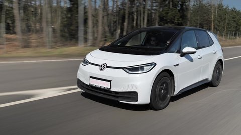 MINSK, BELARUS - APRIL 10, 2021: Volkswagen ID.3 Pro S drives on a highway during a sunny spring day. ID.3 is one of the best selling electric vehicles in the world.