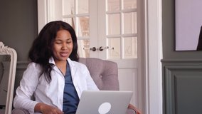 African female doctor talk with patient make telemedicine online webcam video call. Black woman therapist. Telehealth concept