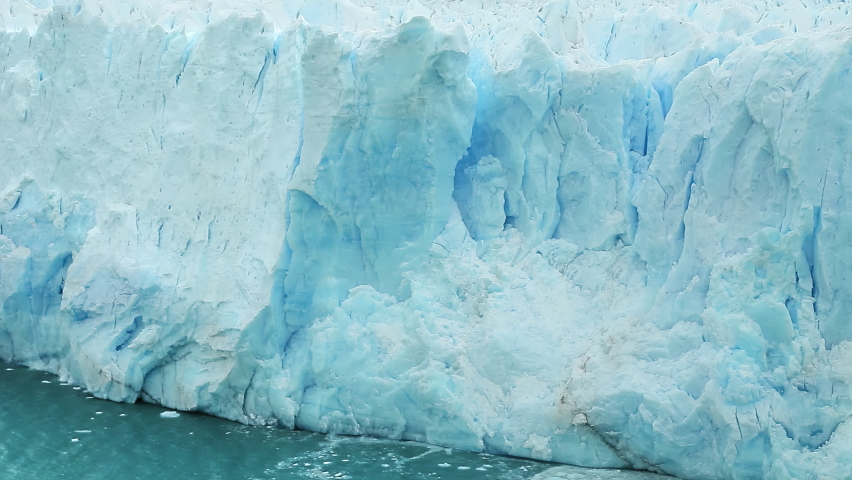 Action of piece of Perito Moreno Glacier breaking and falling in water, Los Glaciares National Park, Santa Cruz Province, Patagonia, Argentina, South America, 4k footage in slow motion | Shutterstock HD Video #1070711428