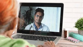 senior women online consultation with doctor on laptop 