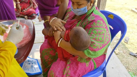 Ghatal,West Bengal,India - April 08, 2021: Pentavalent Vaccination, contains five antigens - diphtheria, pertussis, tetanus, and hepatitis B and Haemophilus influenzae type b at village in India
