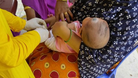 Ghatal,West Bengal,India - April 08, 2021: Pentavalent Vaccination at rural area in India that contains five antigens - diphtheria, pertussis, tetanus, hepatitis B and Haemophilus influenzae type b