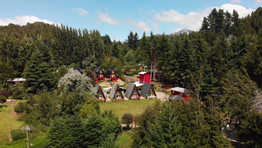 A frame home community in middle of forest