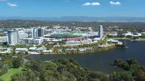 Aerial view of Belconnen Town Centre and Lake Ginninderra on a sunny day in Canberra, Australia 