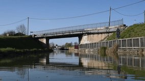 Road bridge over canal Nivernais in Burgundy (France), video footage taken from a boat