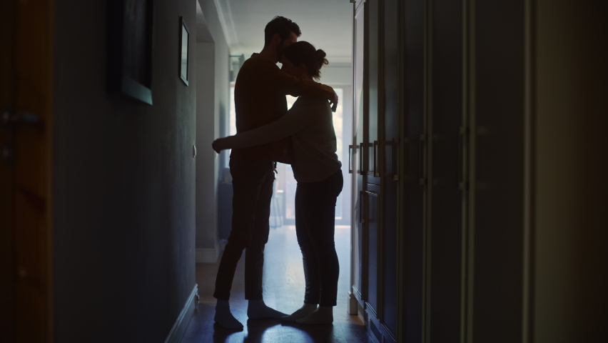 Sad Couple Embracing, Comforting Each other in Difficult Times. Family Overcoming Difficulties Together, Tender Moment. Atmosphere of Sadness and Tragedy. Cinematic Moment of Human Drama | Shutterstock HD Video #1070800699