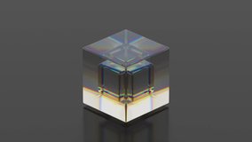 A small glass cube spins counterclockwise inside a large one that spins clockwise and bounces. Reflection of light. Seamless loop. - Powered by Shutterstock - Get 15% off with code: PIKWIZARD15