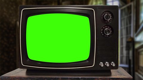 Old TV. Vintage retro old tv set green screen background with noise and static, isolated background, copy space, empty, template mockup with intro and outro glitch noise effect