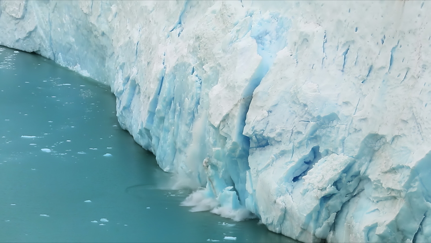 Los Glaciares National Park, Santa Cruz Province, Patagonia, Argentina. Natural beauty of towering glacier surrounded by glacial lake. A large mass of ice falls into the water. High quality 4k footage | Shutterstock HD Video #1070824420