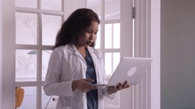 Black female doctor. webiran of doctors. Telemedicine the use of computer and telecommunications technologies for the exchange of medical information