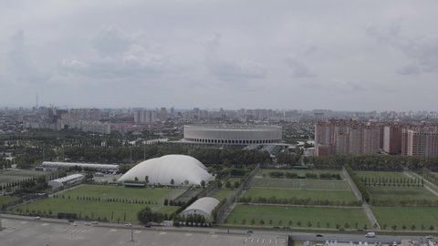 D-Log. Krasnodar, Russia - August 28, 2020: Krasnodar - football stadium of the eponymous club in the city of Krasnodar. Public Park Krasnodar (Galitsky Park). Summer aerial view, Aerial View