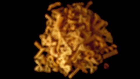 Super slow motion drops the dry pasta. On a black background. Filmed on a high-speed camera at 1000 fps.High quality FullHD footage