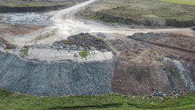 Aerial video of mining rock dumps. Siberia, Russia