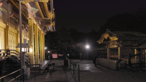 tokyo, japan - november 05 2020: Pan video of the golden Ueno Tosho-gu shrine dedicated to the first Shogun of Edo era Tokugawa Ieyasu and classed as Important cultural property at night.