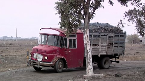 Rio Negro, Argentina - March 2020: Old Logging Truck arriving at Train Station from the Patagonian Railway, in Rio Negro, Argentina. 