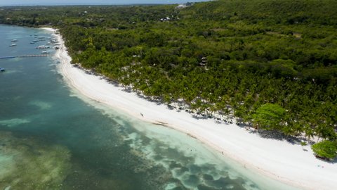 Aerial panning showing Bohol Beach Club and the private beach on Panglao Island.