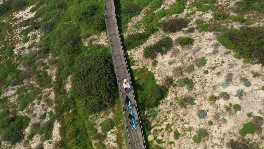 Girl are going to Surf in Europe Portuguese beach 1