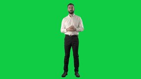 Young silent business man presenting strategy and demonstrate on business meeting. Full length on green screen chroma key background. - Powered by Shutterstock - Get 15% off with code: PIKWIZARD15