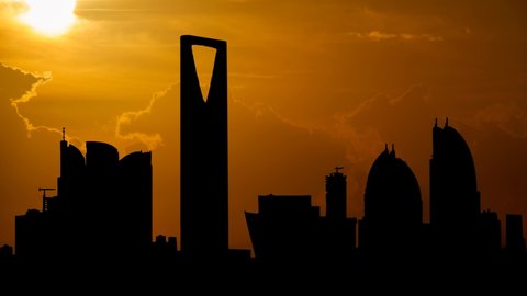Riyadh Skyline: Time Lapse at Sunset with Red Sun and Fiery Sky, Saudi Arabia