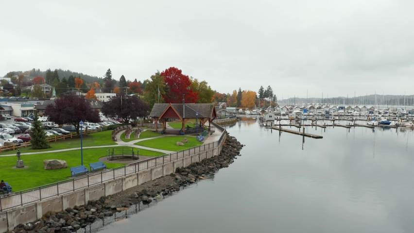 Green public park by the marina near a coastal town in Washington, USA