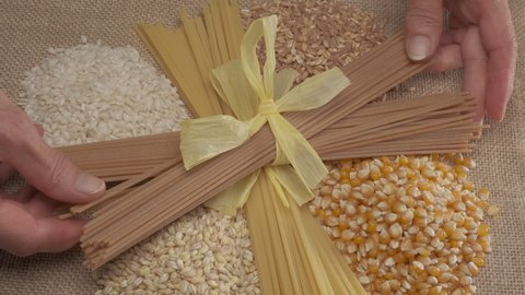 Mixed cereals wholemeal integral pasta spaghetti, mais rice barley spelt Mediterranean diet, vegan vegetarian nutrition