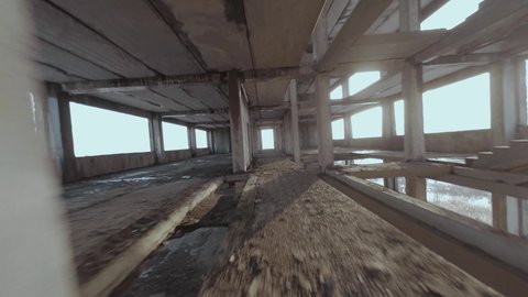 FPV drone flies through an abandoned building. วิดีโอสต็อก