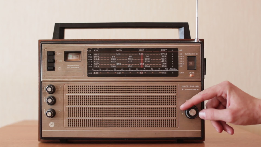 Vintage receiver. Tuning analog radio dial frequency on scale. | Shutterstock HD Video #1071002893