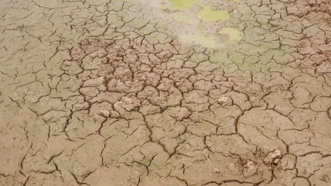 Aerial view Footage B roll of Climate change concept. Aerial fly drone over view dry lake and climate change. The drought of the river caused by global warming. Footage B roll scene 4k.
