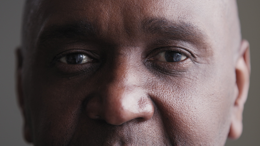 Close-up sad black male eyes looking at camera, african mature elderly man suffering from poor eyesight problem enjoying good vision after successful laser correction operation in ophthalmology clinic Royalty-Free Stock Footage #1071013435
