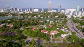 Aerial video Miami luxury homes and Indian creek with view of ocean 5.4k aerial