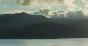 Timelapse video of breathtaking summer sunset landscapes, mountainous, misty and full of clouds, on the Galician coast, Ortigueira, near Cape Ortegal, La Coruña province, Spain.