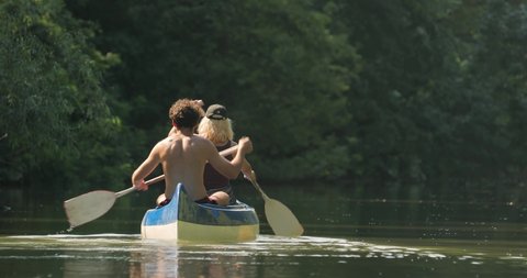 Canoeing in summer sunlight Tisza river passage, Lake Tisza, Hungary