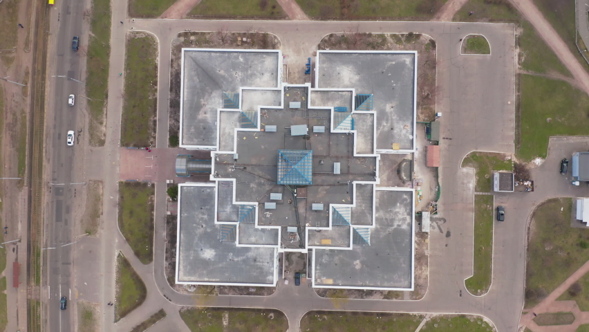 symmetrical soviet architecture from above. view of the buildings and symmetrical square. summer day with an urban area of the city of Kiev. hospital in eastern europe. 4k footage Aerial
