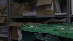 Adult Male Hands Slowly Opening Green Plastic Container Lid In Office Basement. Close Up, Locked Off - Powered by Shutterstock - Get 15% off with code: PIKWIZARD15