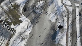 Aerial view of people skating on frozen pond in the Netherlands - Powered by Shutterstock - Get 15% off with code: PIKWIZARD15