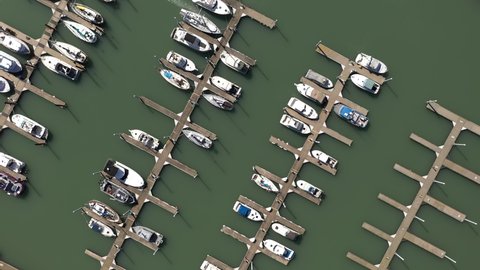 Aerial panoramic view over boat moored in Brookings harbor, Oregon