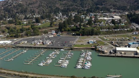 Brookings , Oregon , United States - 02 11 2021: Brookings Oregon harbor. Aerial circle and tilt up.