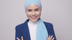  young beautiful muslim businesswoman with hijab isolated on white background studio - Powered by Shutterstock - Get 15% off with code: PIKWIZARD15