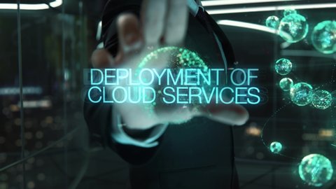Businessman with Deployment of Cloud Services hologram concept
