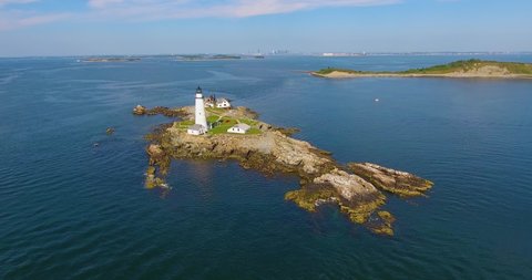 Boston Lighthouse on Little Brewster Island in Boston Harbor, Boston, Massachusetts MA, USA.