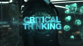 Businessman with Critical Thinking hologram concept - Powered by Shutterstock - Get 15% off with code: PIKWIZARD15