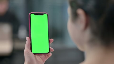Indian Woman using Smartphone with Green Screen 