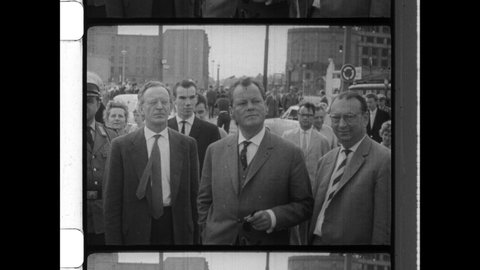 August 13, 1961 Berlin, Germany. Mayor Willy Brandt watching Soviet Soldiers begin to build the Berlin Wall, first with barbed wire and later with stone. 4K Overscan of Archival 16mm Film Print