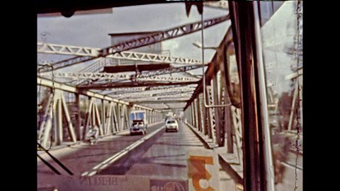 Cairo, EGYPT, AFRICA - circa 1981: touristic tour by bus to Cairo city. Crossing Al Marazeek, bridge. Historical archival of Egypt in the 1980s.
