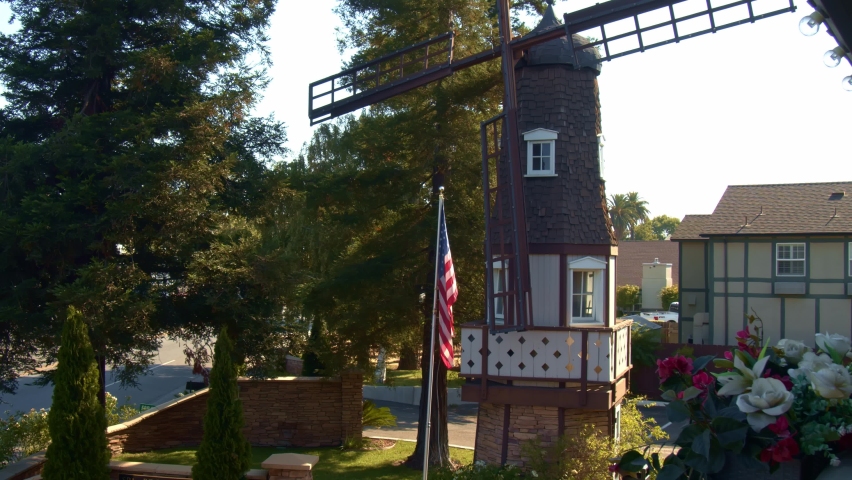 Old European Style Hotel With Windmill Building