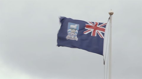 Flag of Falkland Islands in the Harbor of Port Stanley (Islas Malvinas). 4K Resolution. 