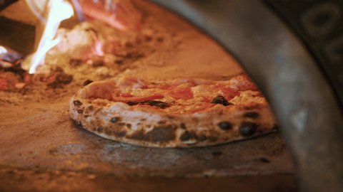 Neapolitan Margherita Pizza Bubbling Cheese in Wooden Oven