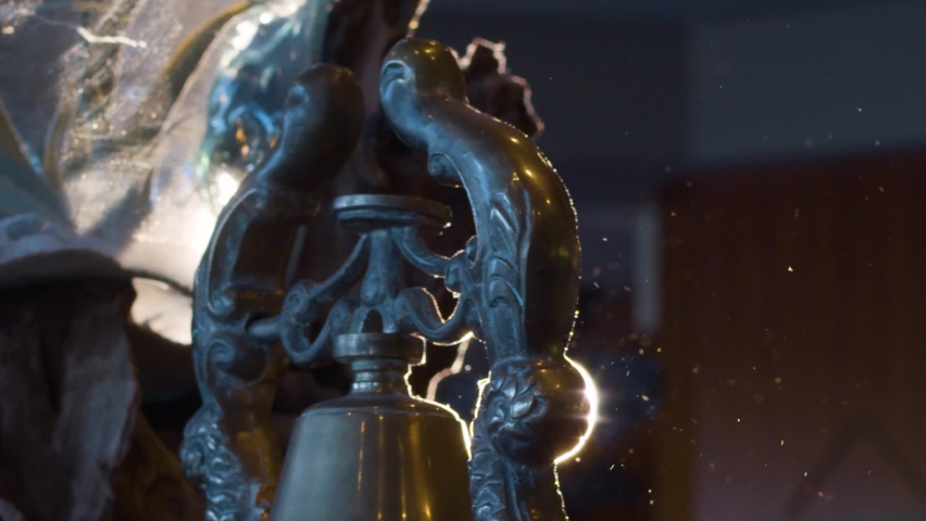 Tracking shot of a beautiful and old bell