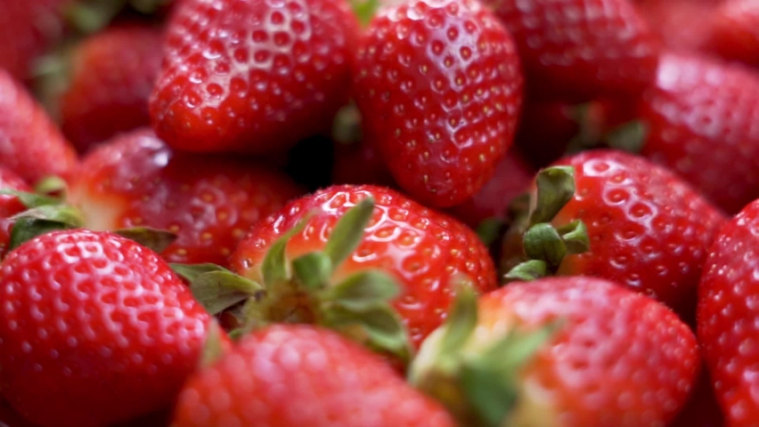 Harvest Of Ripe Red Strawberries, Close-up, Strawberry Rotation. Isolated Fresh Strawberries. Vegetarian Food. Abstract Strawberry Background. Berries, Fruits. Royalty-Free Stock Footage #1071126559