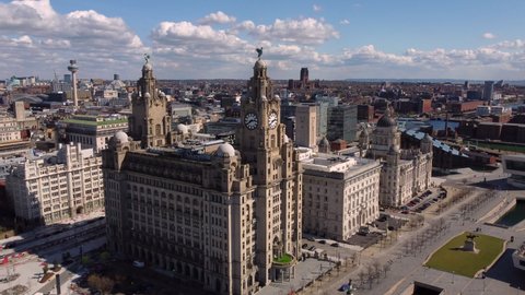 Liverpool, Merseyside, UK - April 12th, 2021: Royal Liver Building Aerial  Footage